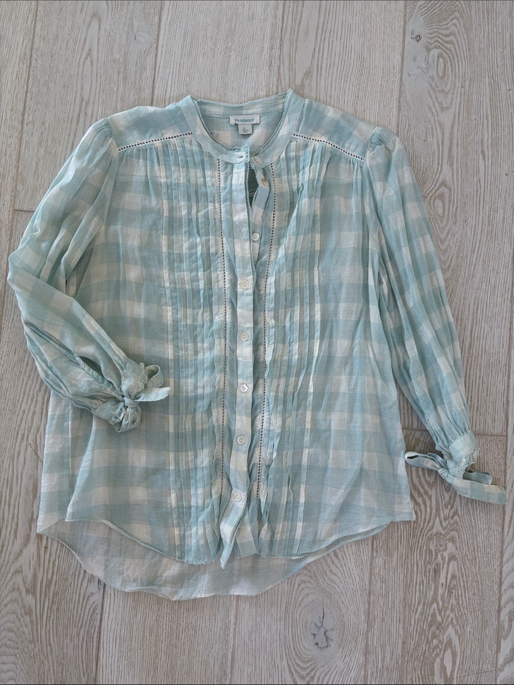 Sundance size small gauzy blouse.